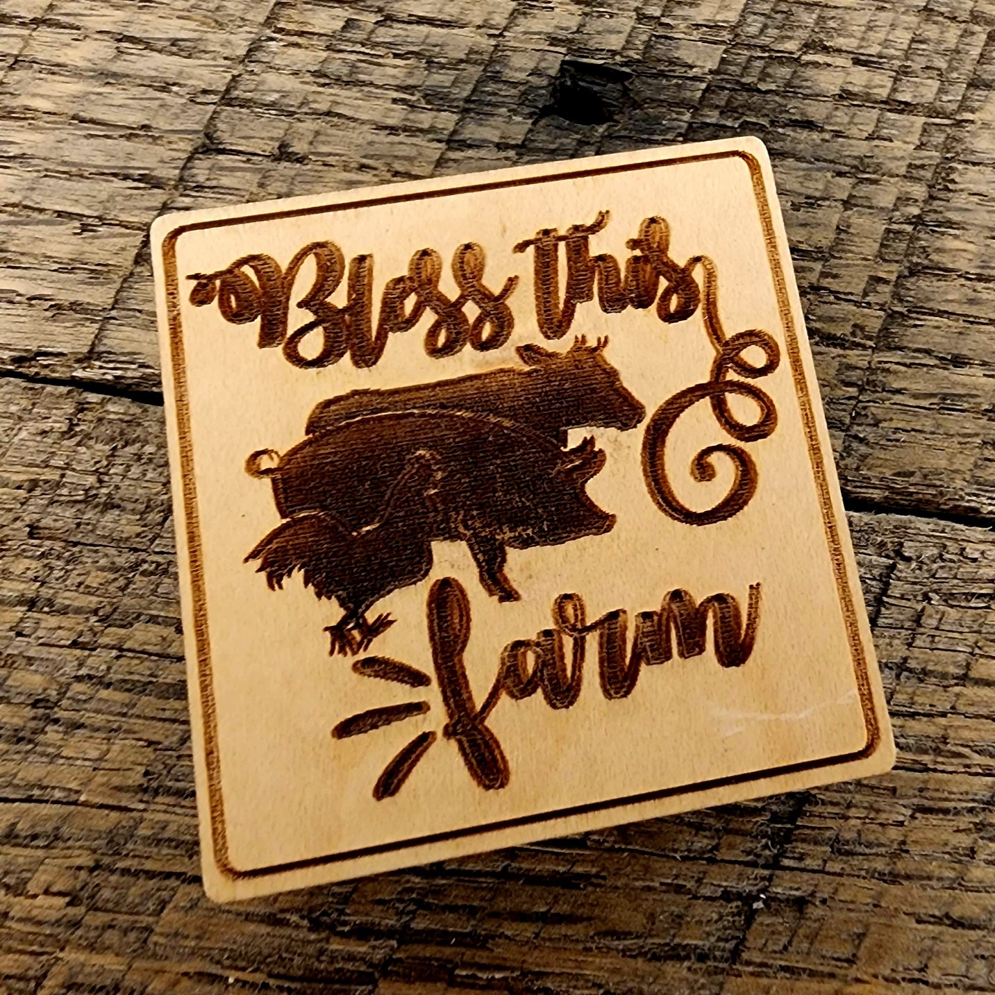 Magnet Inscribed with "Bless This Farm" also has a rooster, pig and cow beside one another