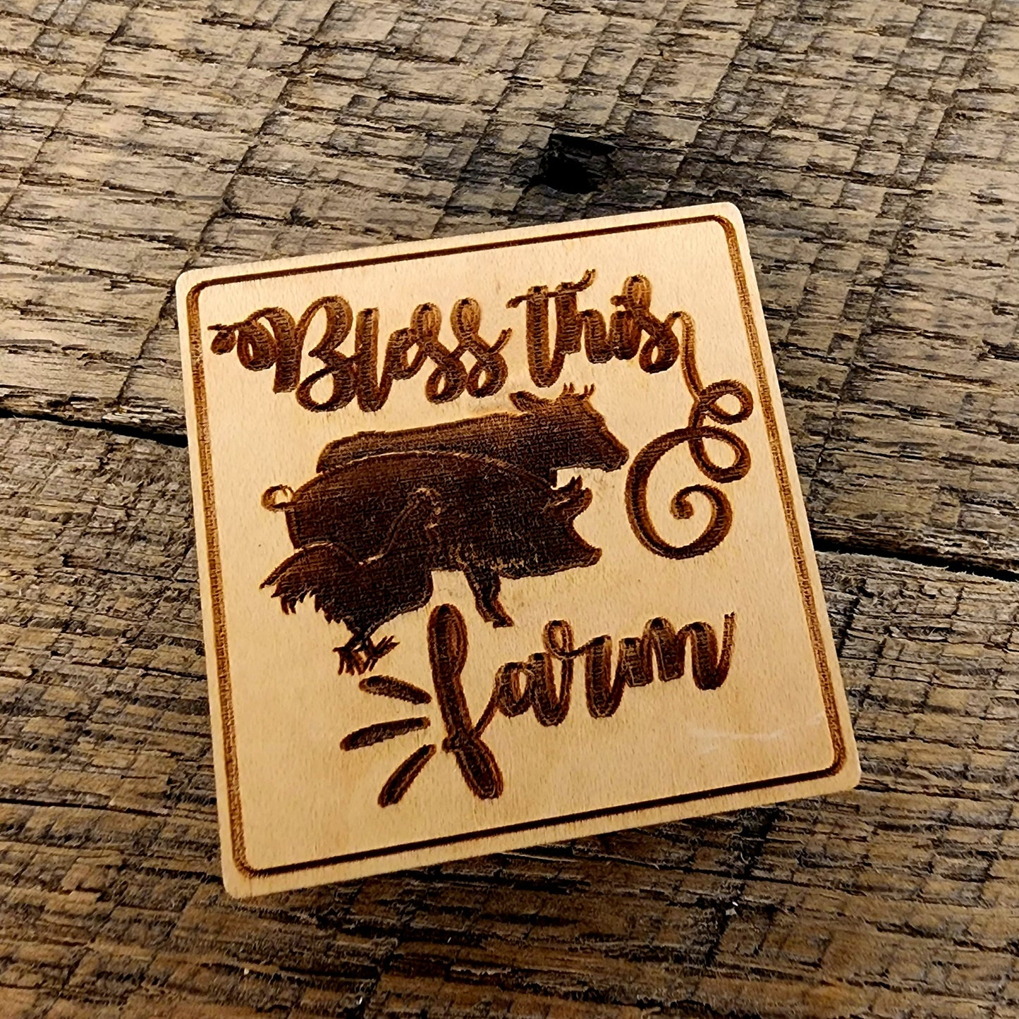 Magnet Inscribed with "Bless This Farm" also has a rooster, pig and cow beside one another