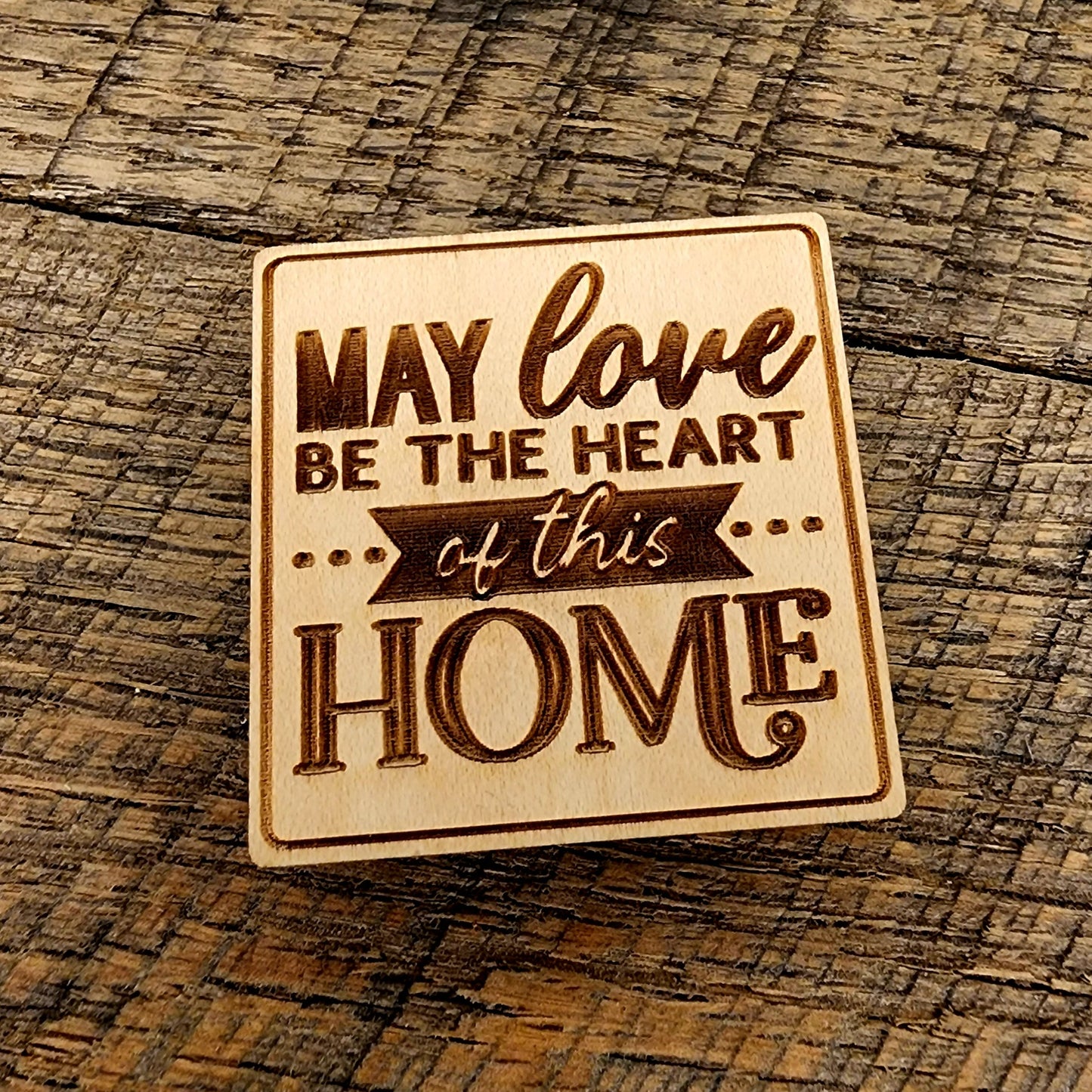 Magnet with the inscription "May Love Be The Heart of this Home"