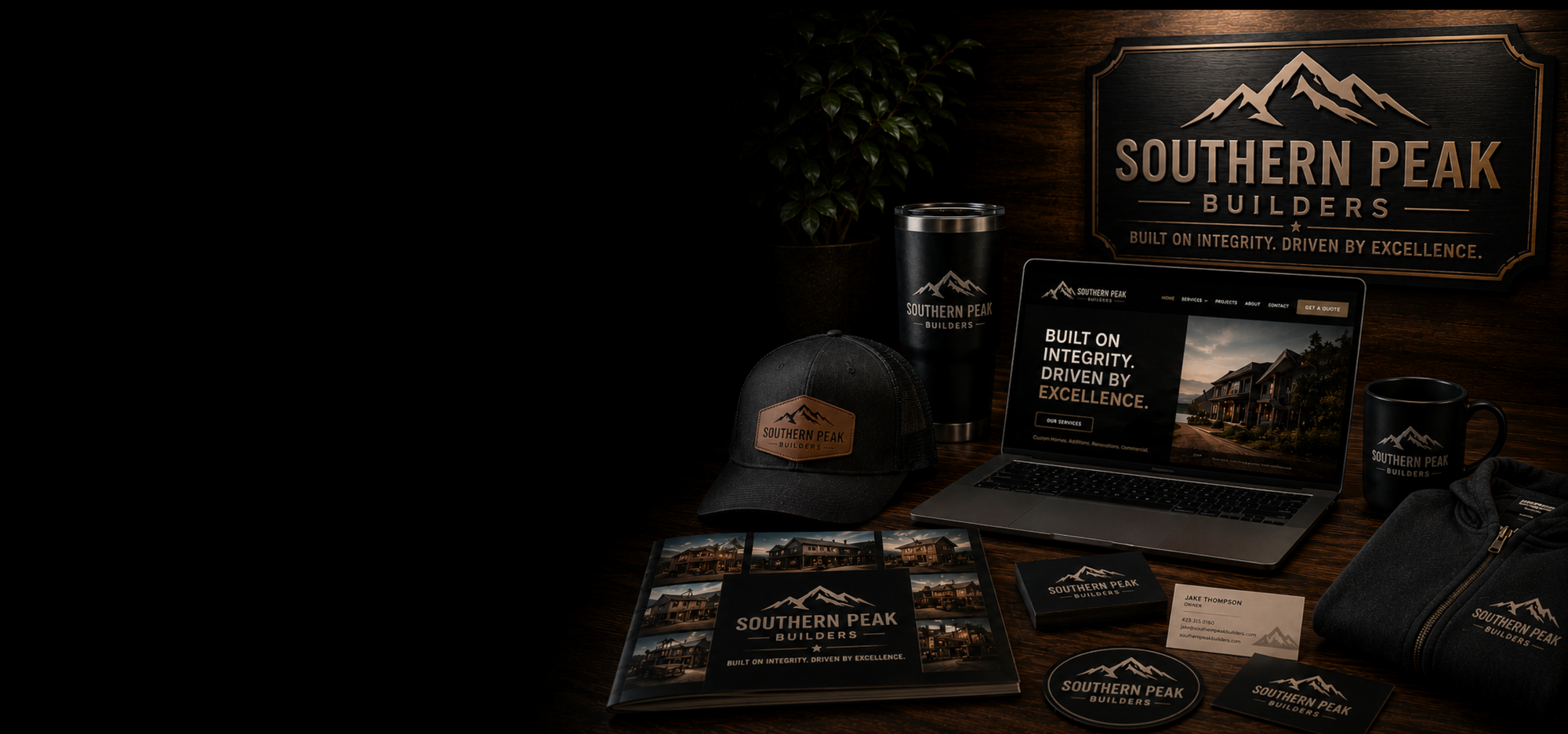 Collection of branded items including a laptop, mug, and cap with 'Southern Peak Builders' logo on a dark background.