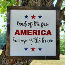 Load image into Gallery viewer, Red Blue and Black Text with a white background - Land of the Free Because of the Brave - America Sign
