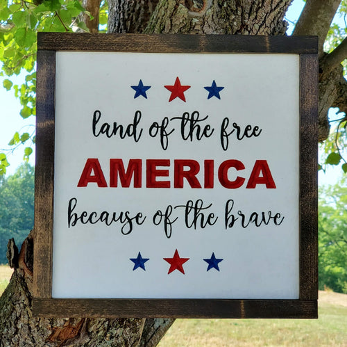 Red Blue and Black Text with a white background - Land of the Free Because of the Brave - America Sign