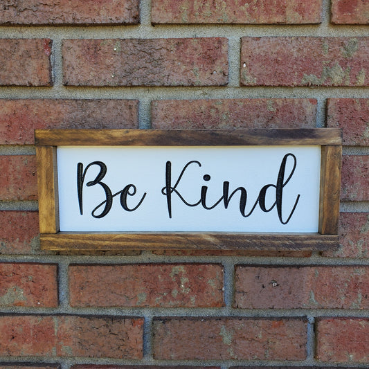 Be Kind Sign. White with black Lettering and honey stained frame