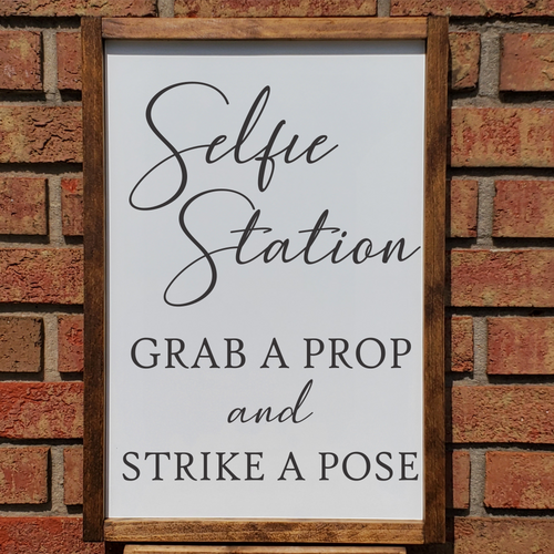 Selfie station grab a prop and strike a pose